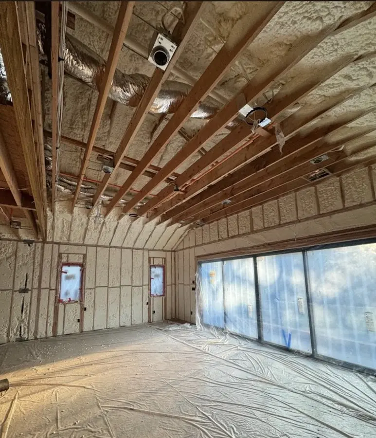 Interior walls and ceiling insulated with spray foam during new construction in Lutherville